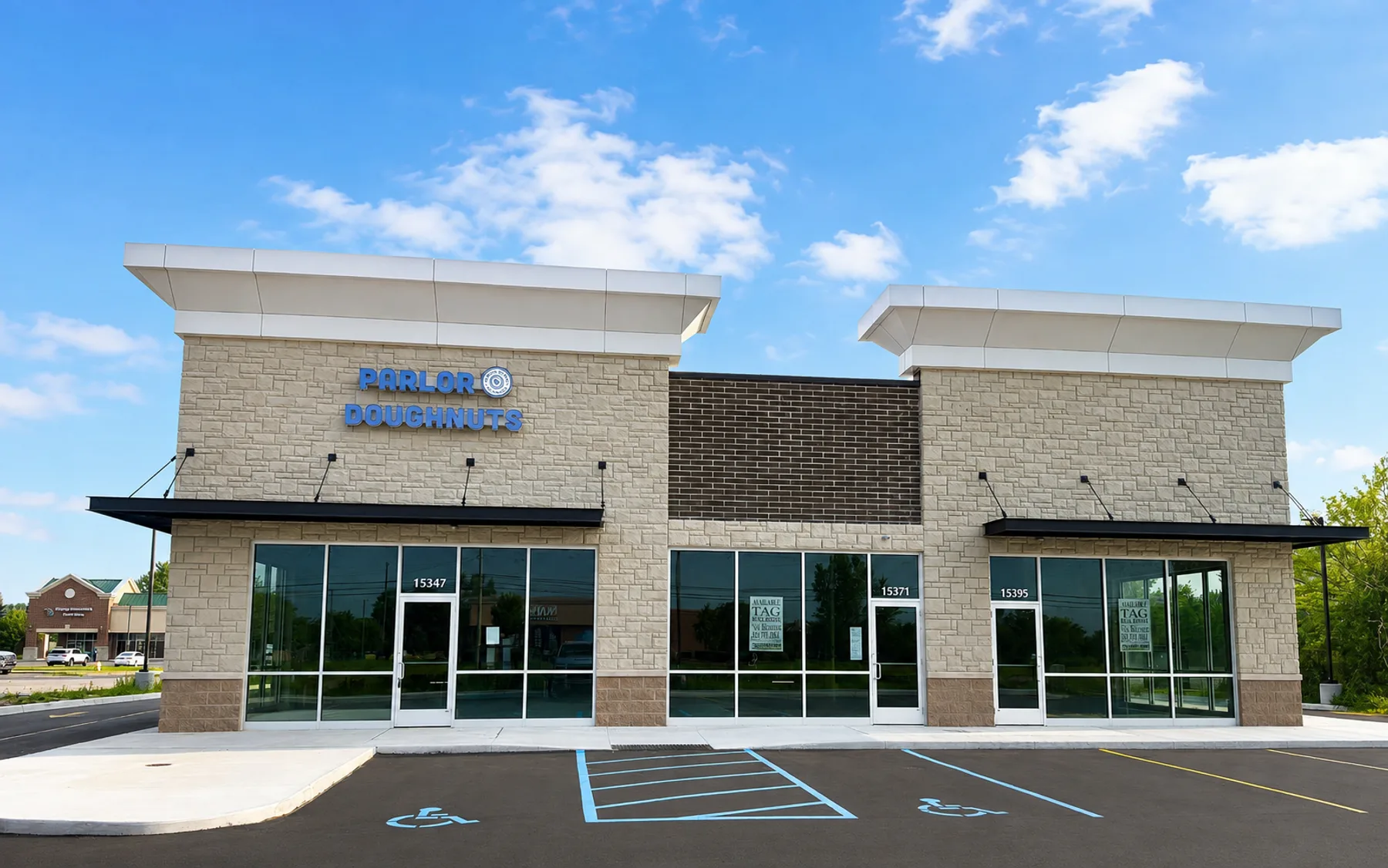 Completed retail building at 21 Mile and Hayes with Parlor Doughnuts open and two available storefronts